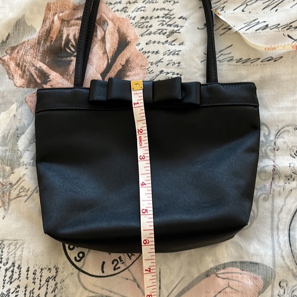 Black satin bow dressy purse with zipper inside. Very lightly used. - Picture 7 of 9